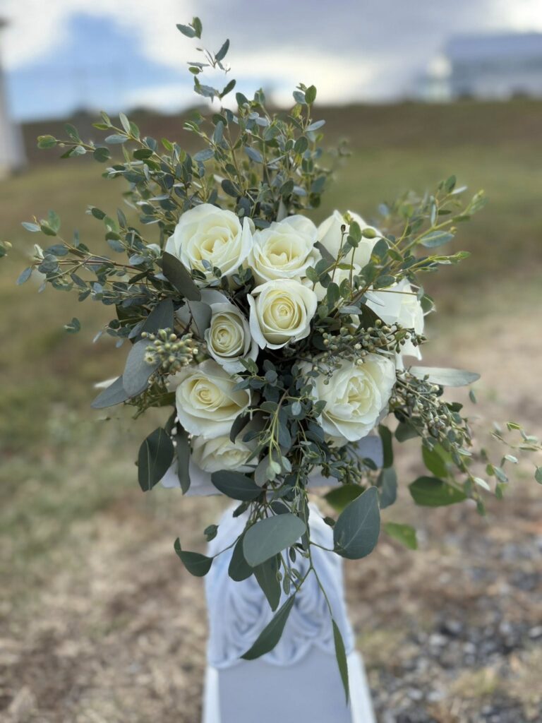 white rose flower arrangement